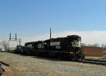 NS 5324 leads a train past the station